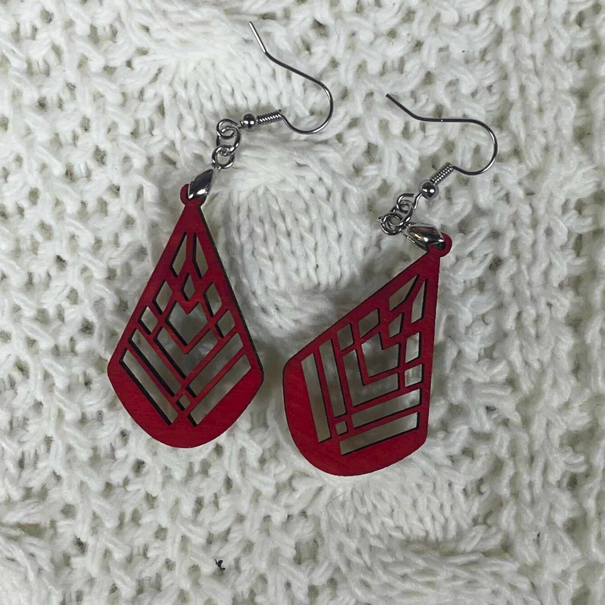 Boucle d'oreille en bois fabrication artisanale